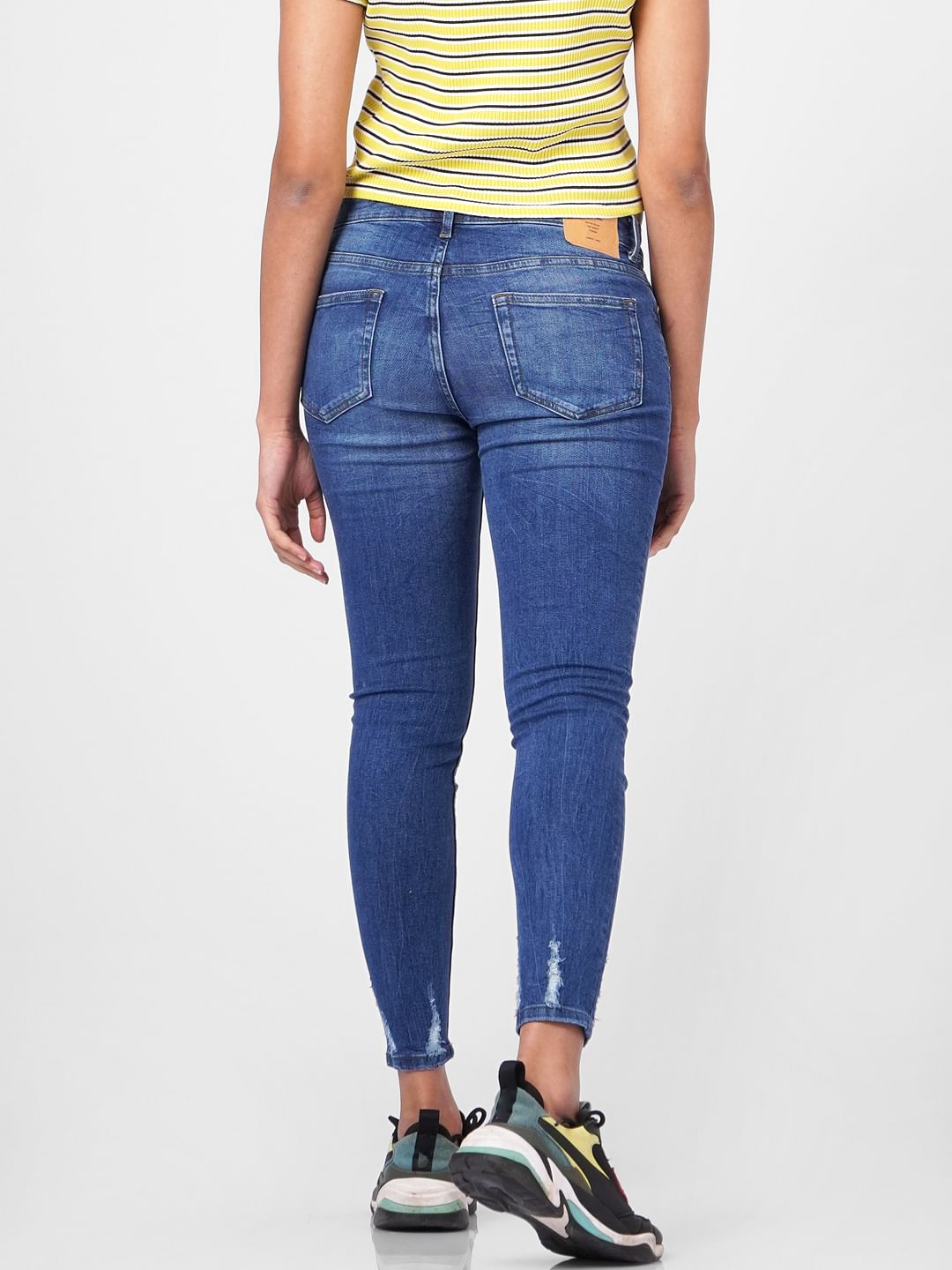 Blue Mid Rise Distressed Skinny Jeans
