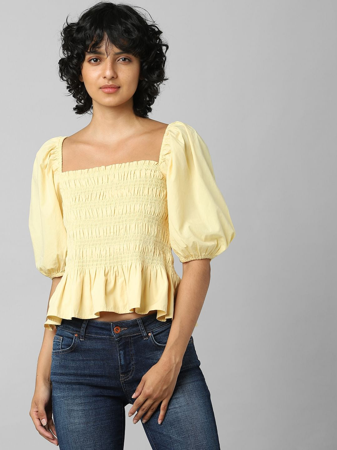 Yellow Smocked Peplum Top