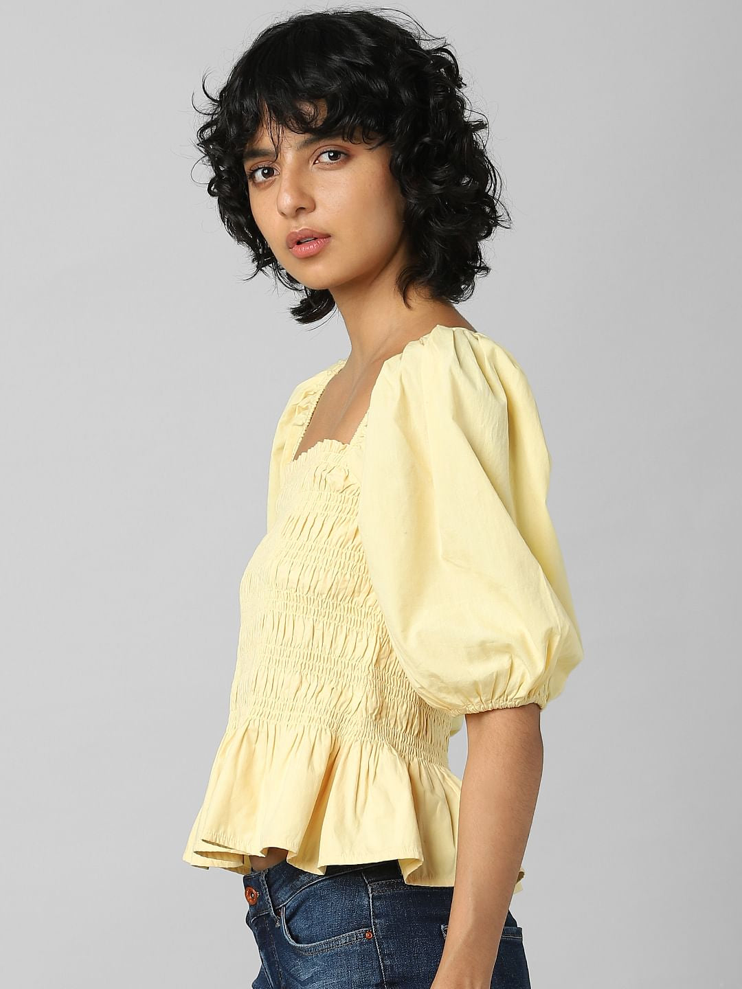 Yellow Smocked Peplum Top