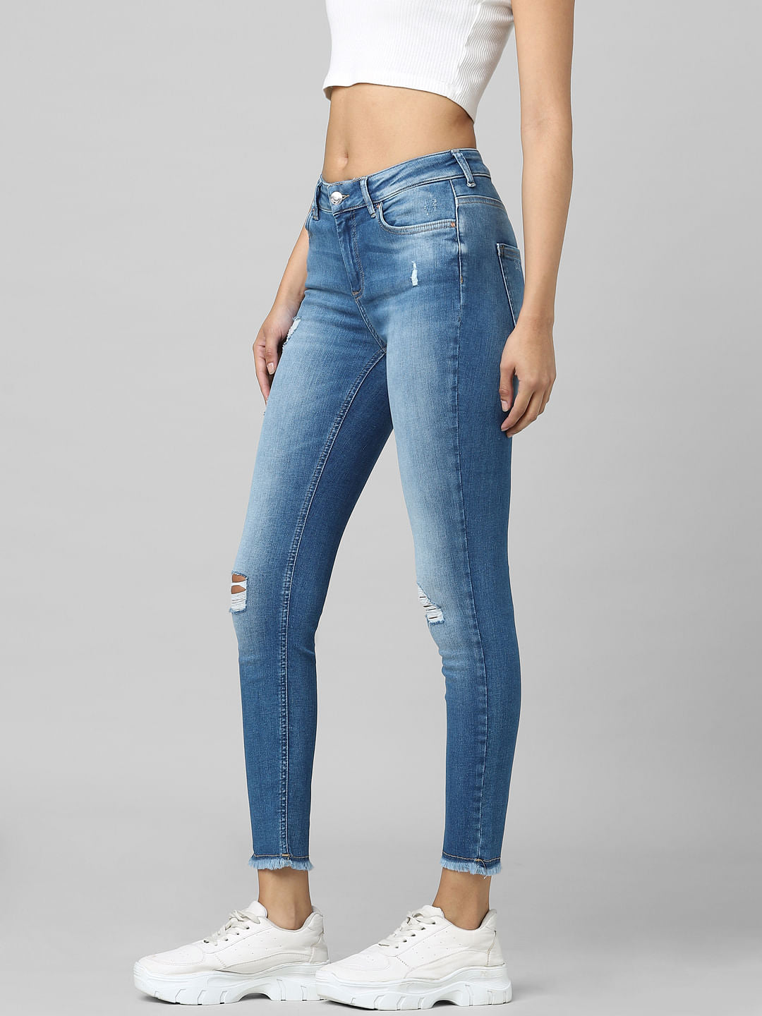 Blue Mid Rise Distressed Skinny Jeans