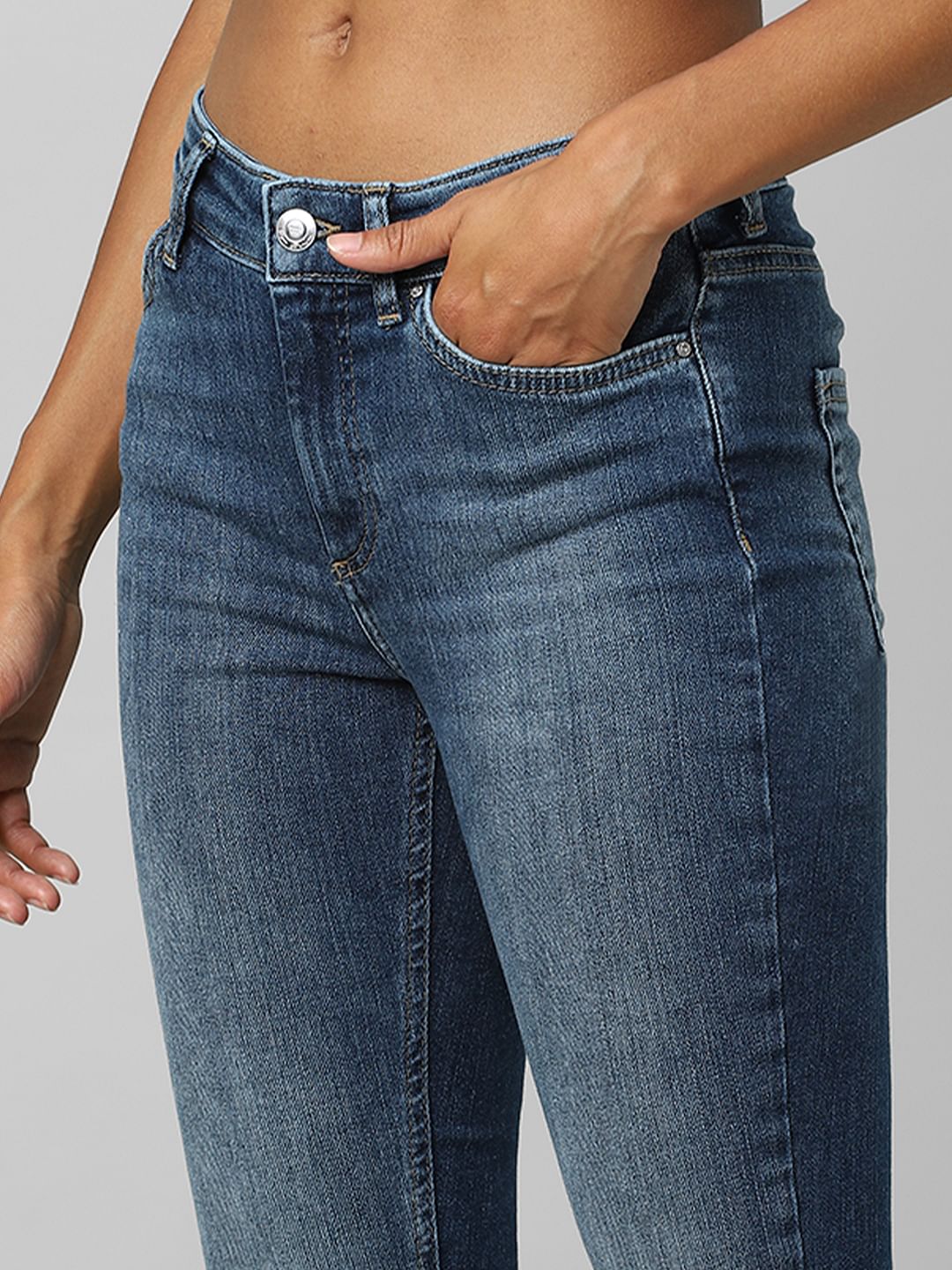 Blue Mid Rise Raw Edge Skinny Jeans