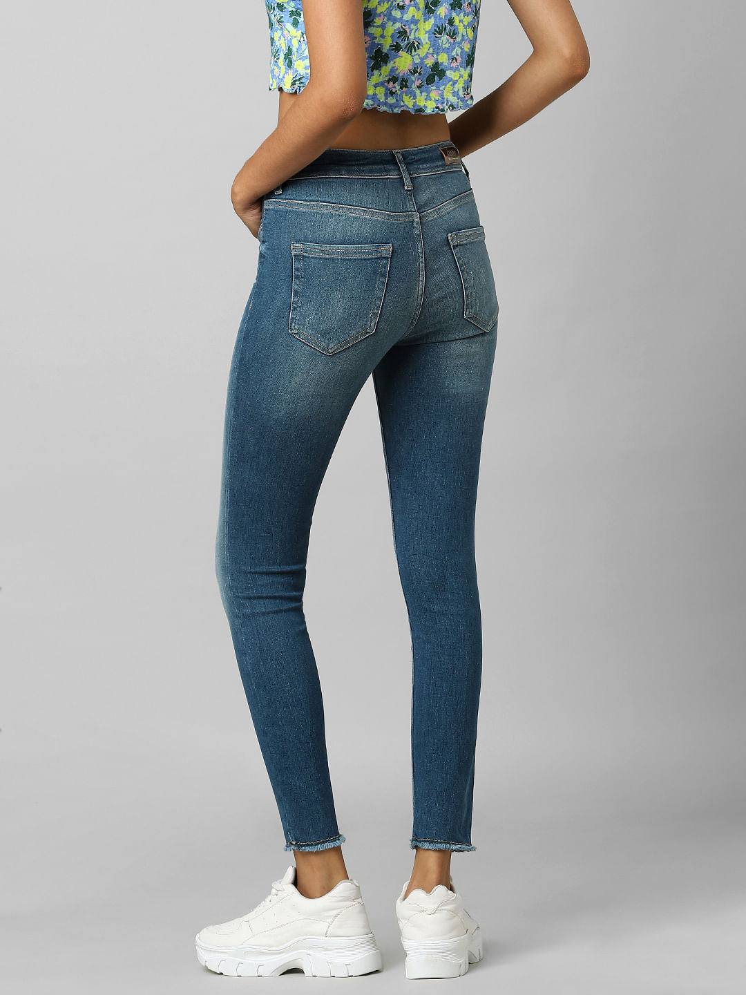 Blue Mid Rise Distressed Skinny Jeans