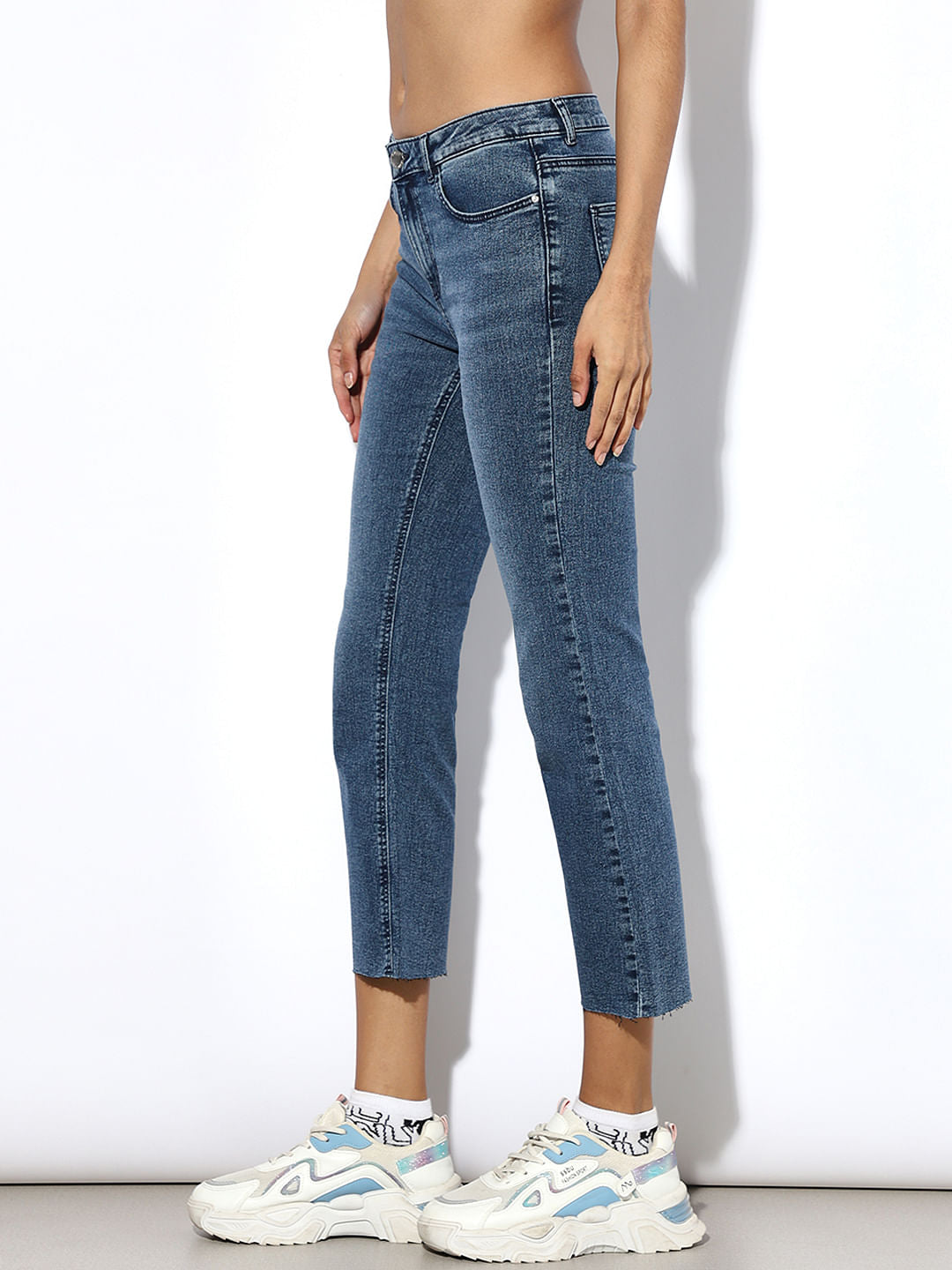 Blue Mid Rise Raw-Edge Flared Jeans