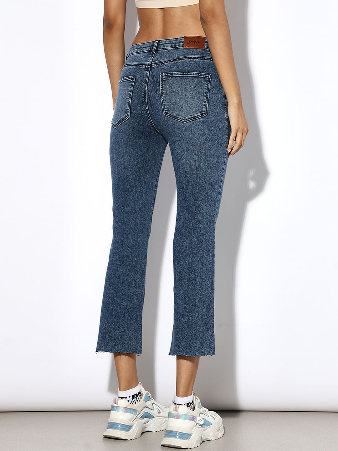 Blue Mid Rise Raw-Edge Flared Jeans