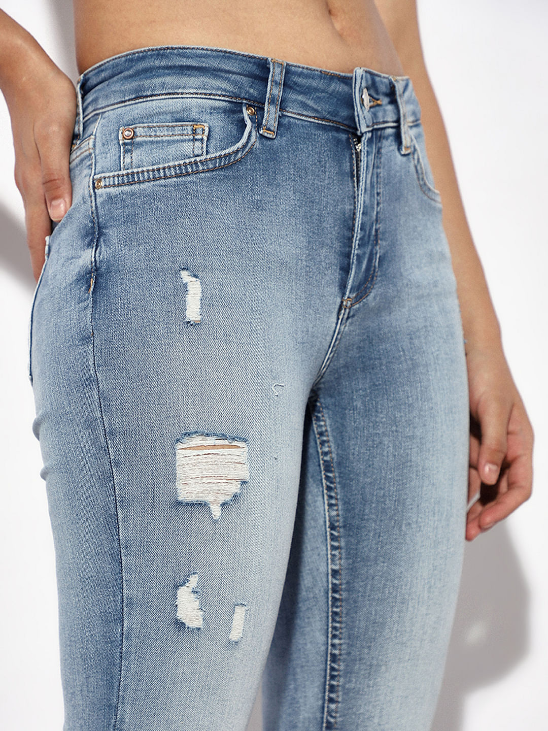 Light Blue Mid Rise Distressed Skinny Jeans