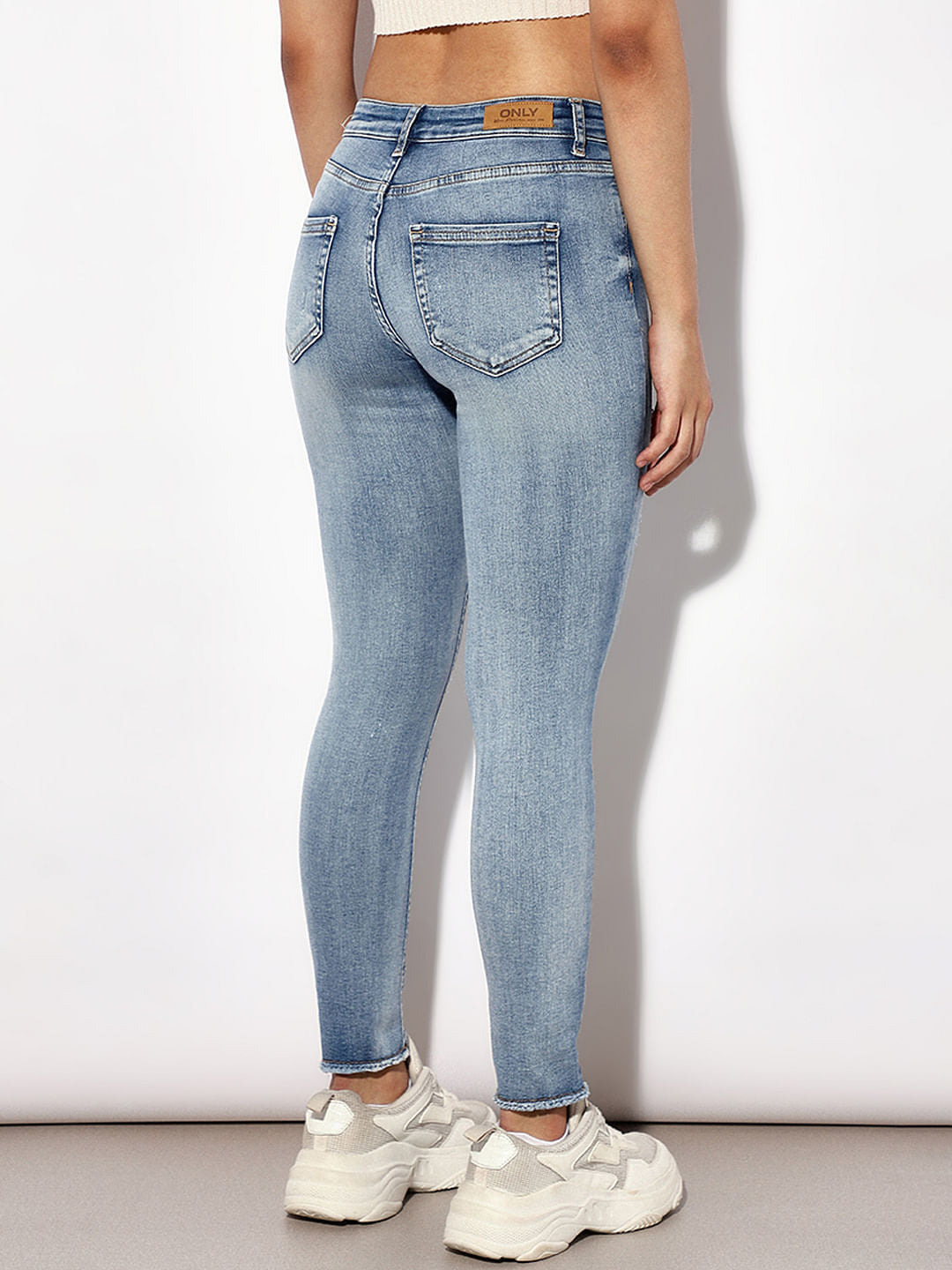 Light Blue Mid Rise Distressed Skinny Jeans