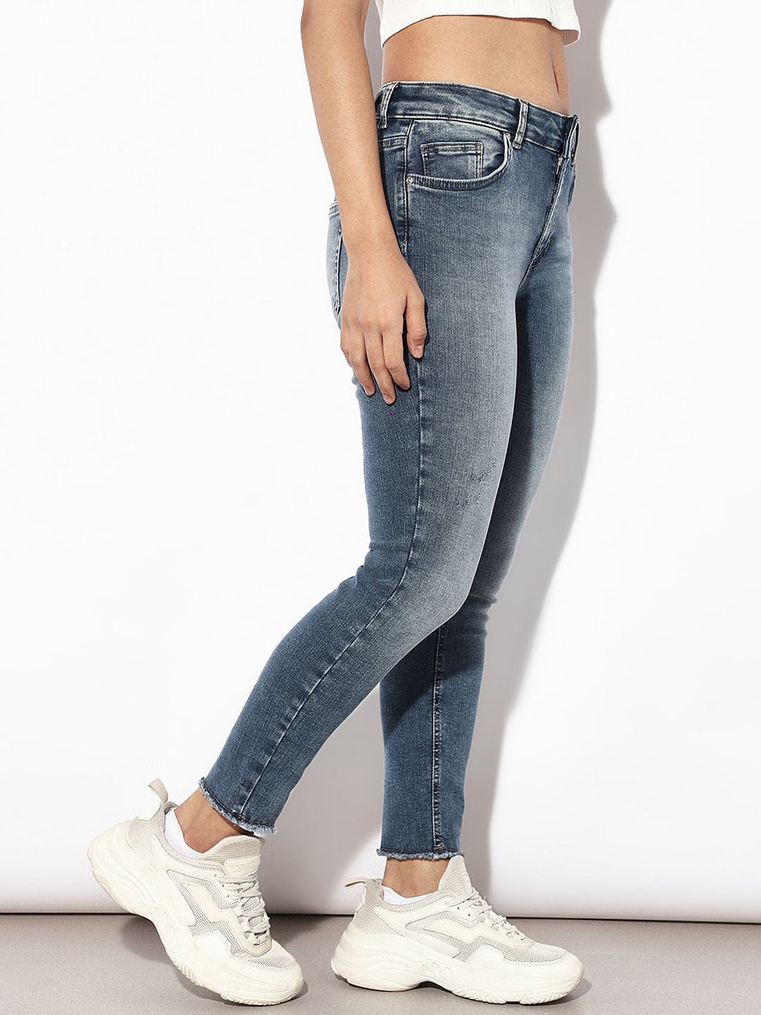 Blue Mid Rise Raw Edge Skinny Jeans