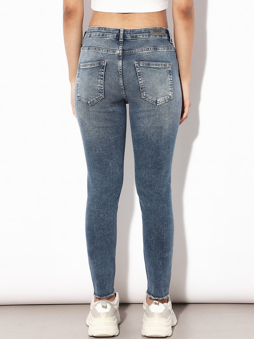 Blue Mid Rise Raw Edge Skinny Jeans