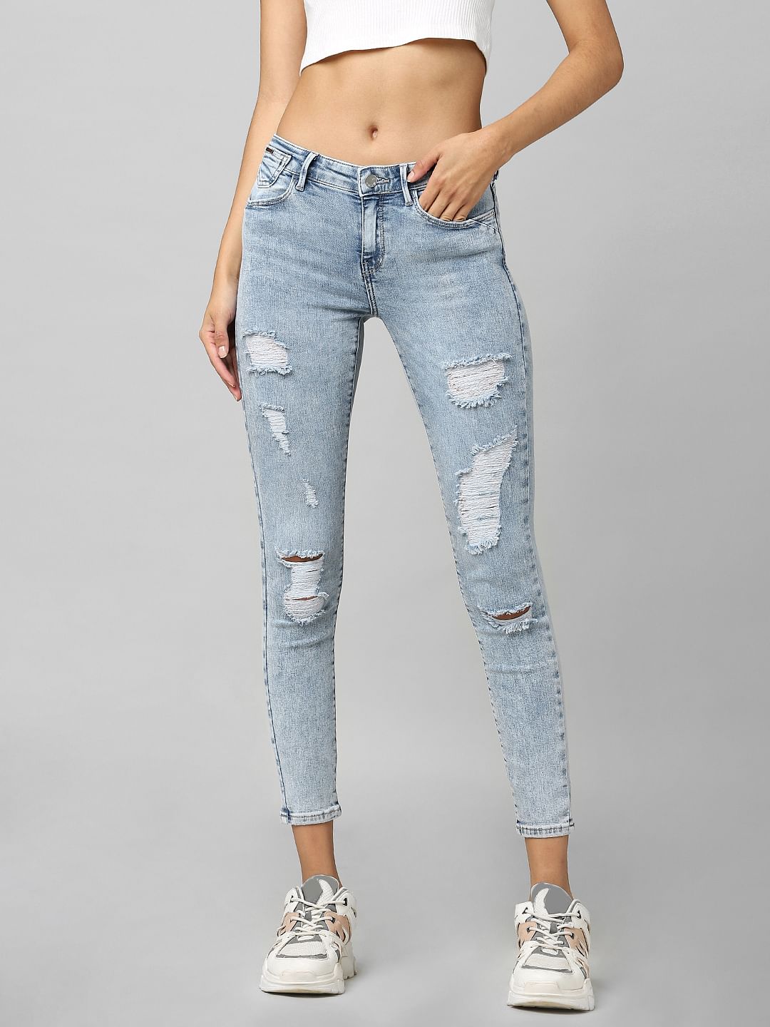 Light Blue Mid Rise Distressed Skinny Jeans