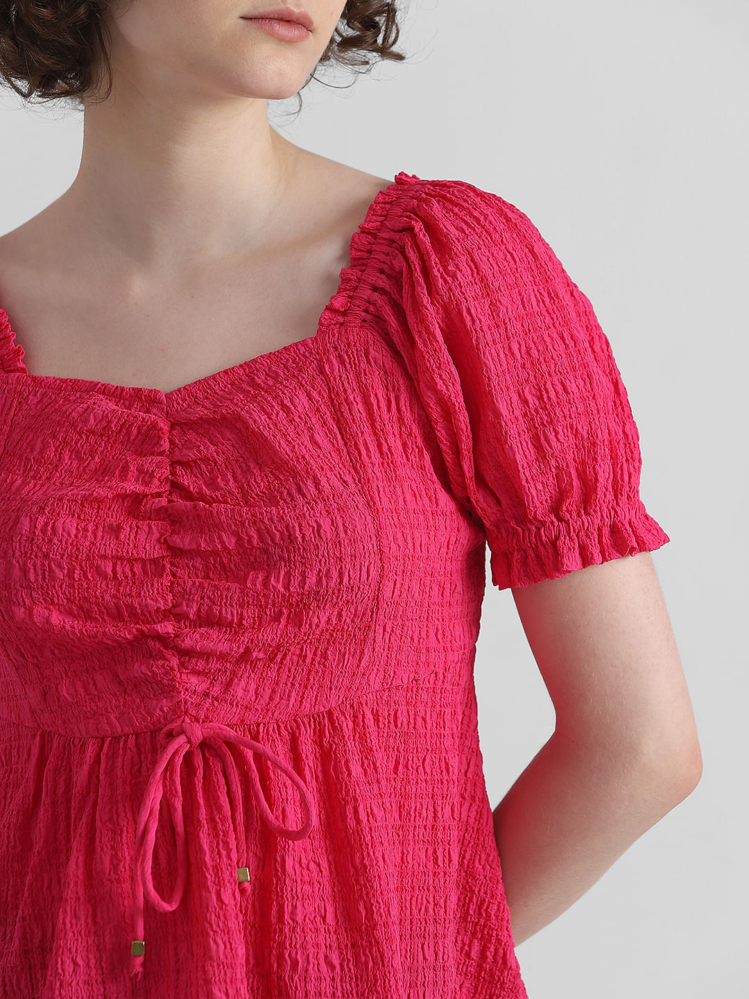 Pink Textured Peplum Top