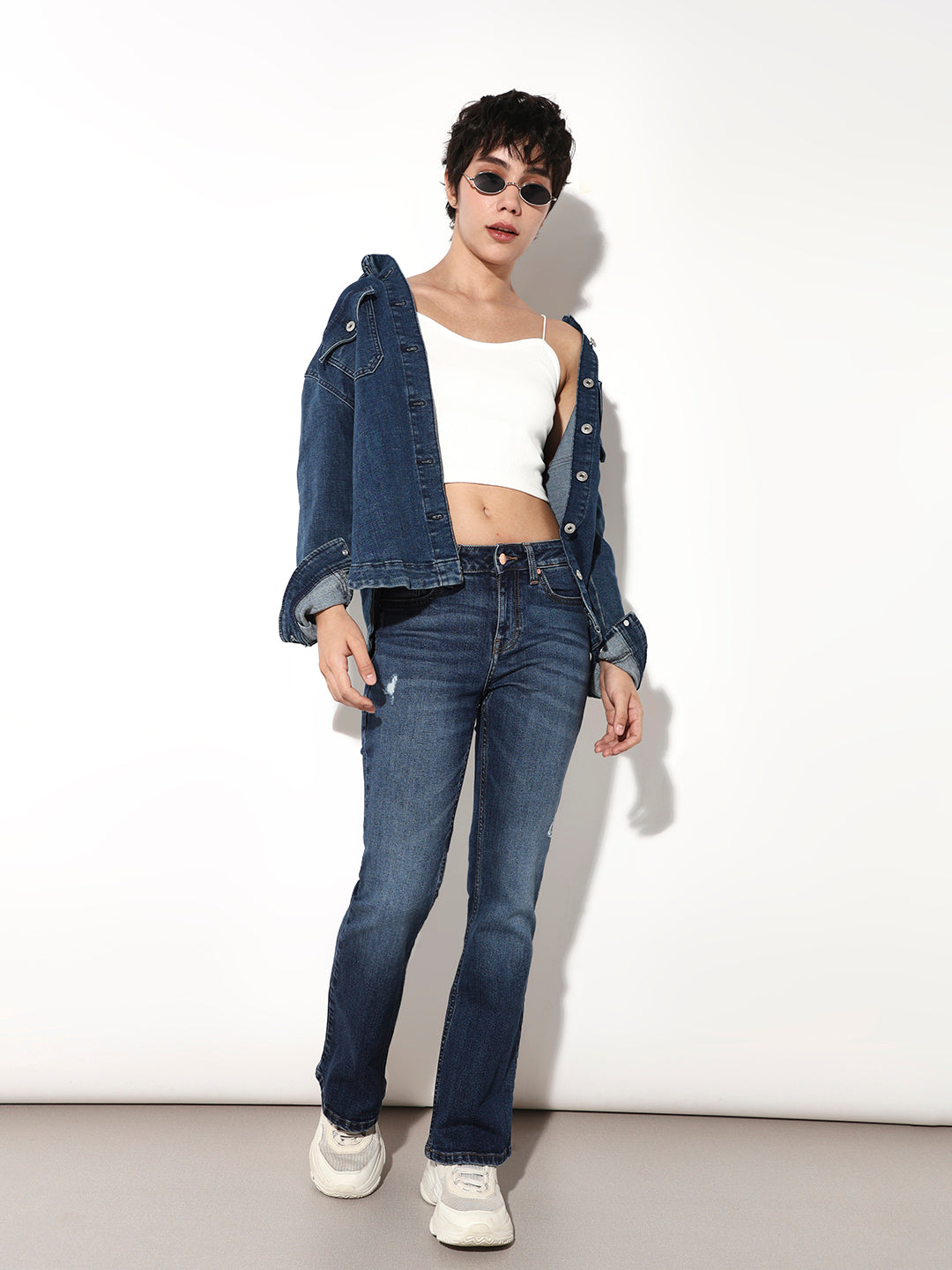 Blue High Rise Distressed Flared Jeans