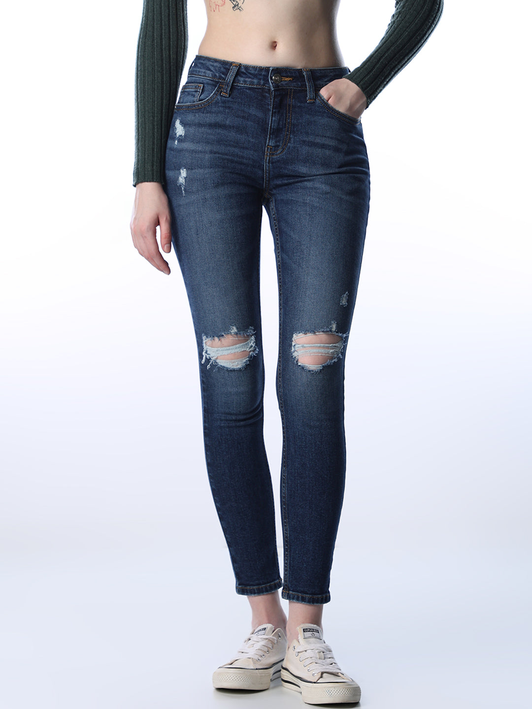 Mid Rise Distressed Skinny Jeans