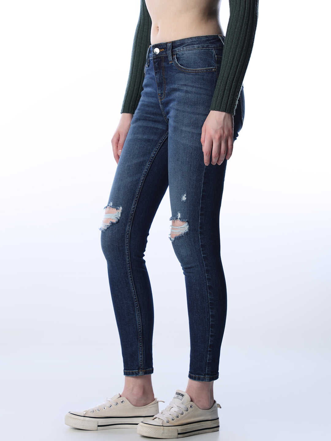 Mid Rise Distressed Skinny Jeans