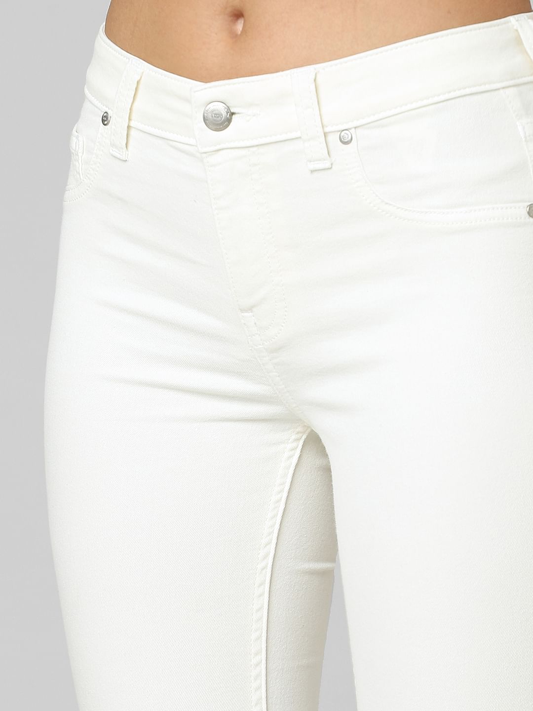 White Mid Rise Skinny Jeans