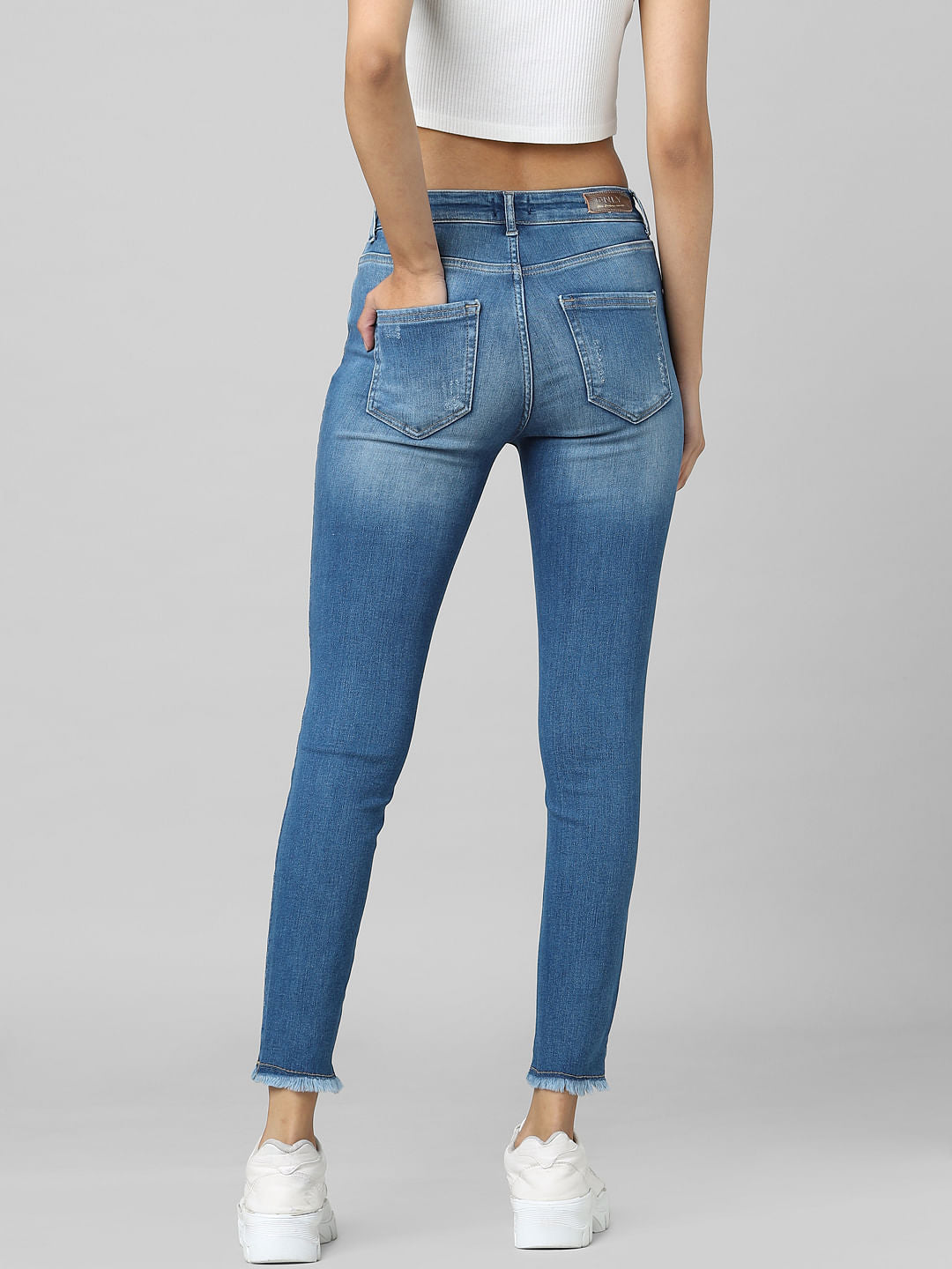 Blue Mid Rise Distressed Skinny Jeans