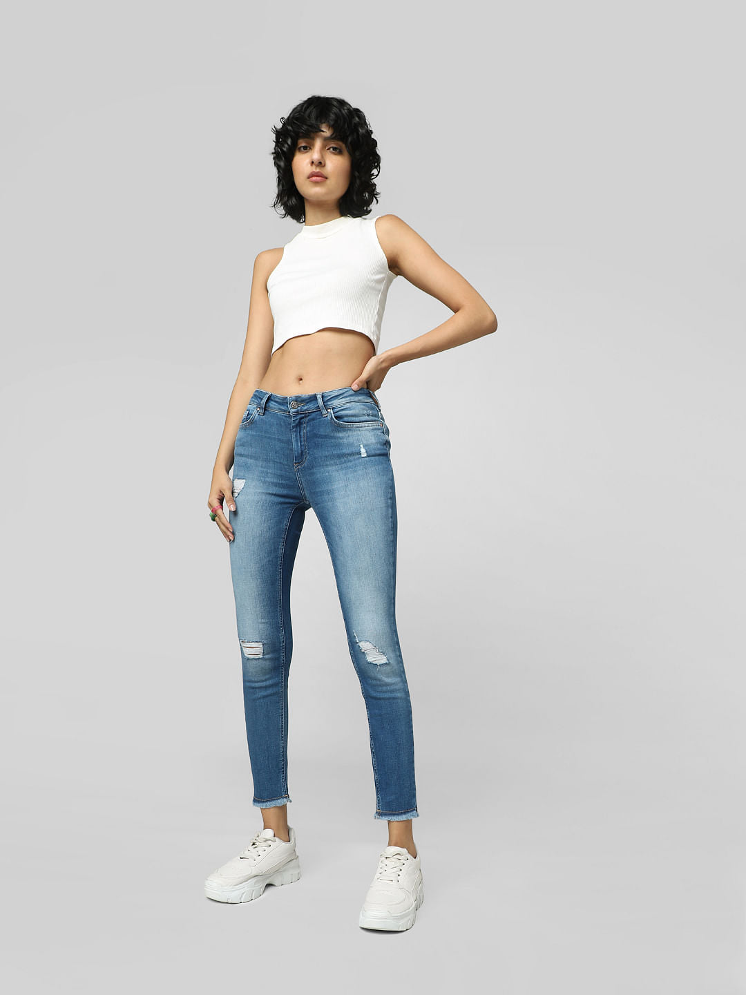 Blue Mid Rise Distressed Skinny Jeans