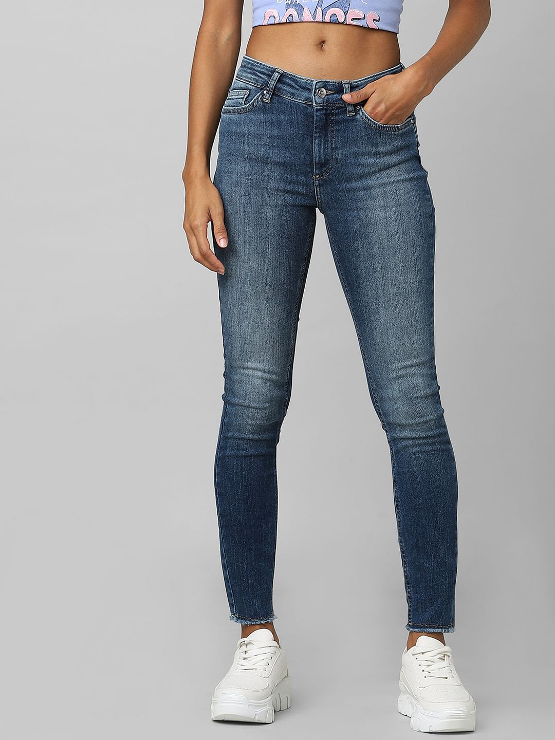 Blue Mid Rise Raw Edge Skinny Jeans