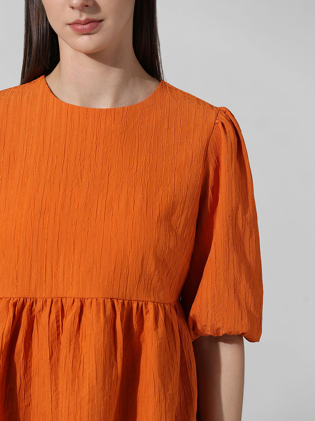 Orange Peplum Top