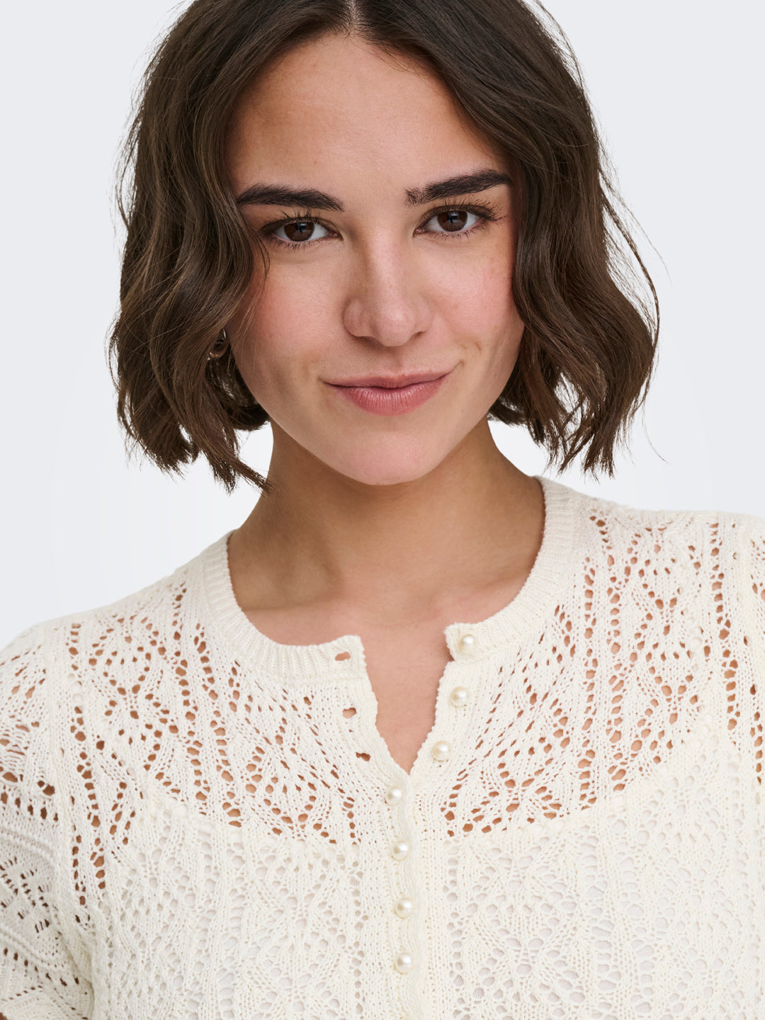 Off-White Pearl Button Knit Top